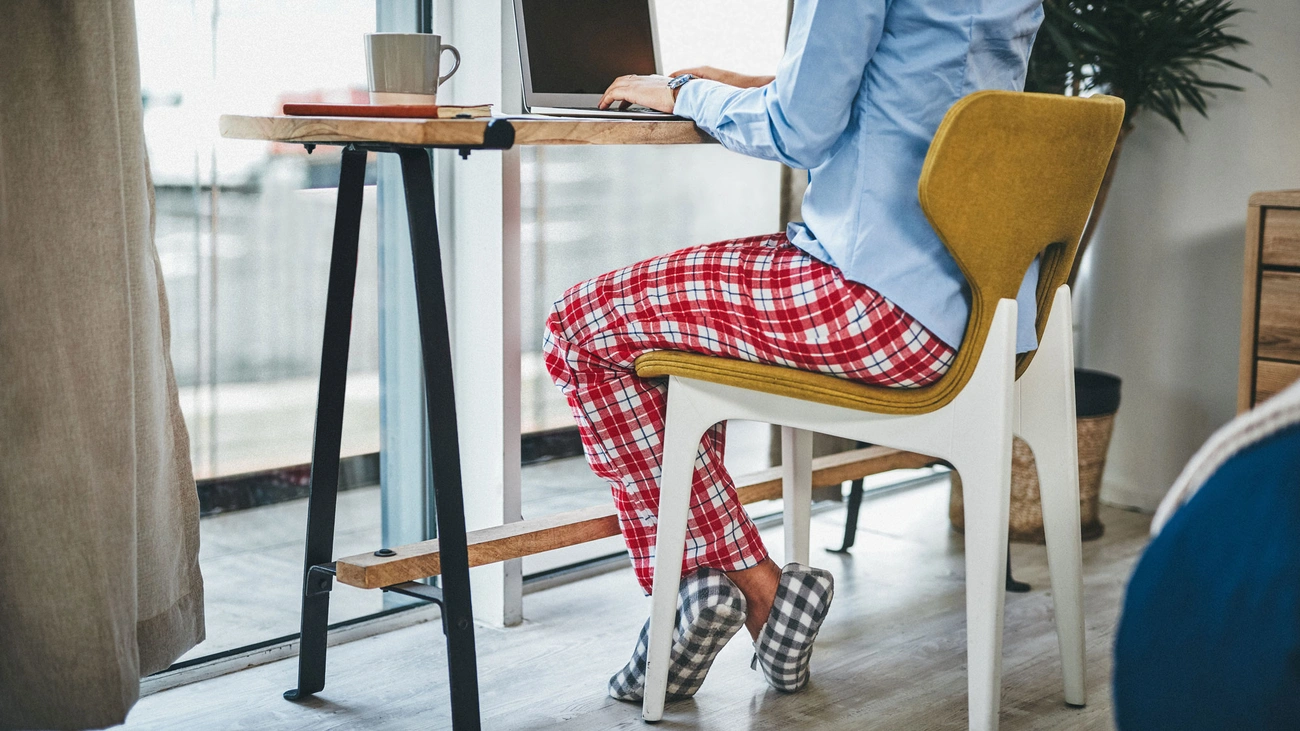 Remote worker negotiating location-based salary adjustment with employer